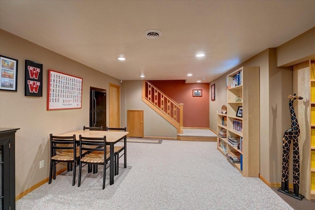 recreation room featuring carpet flooring