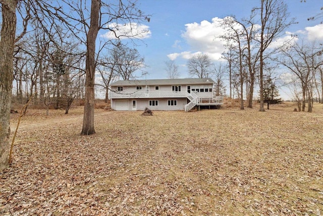 view of front of house with a wooden deck