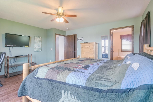 bedroom with ceiling fan, connected bathroom, and light wood-type flooring