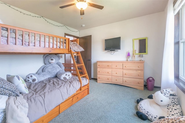 bedroom featuring ceiling fan and carpet flooring