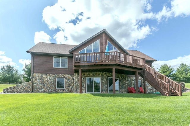 back of property with a lawn and a deck