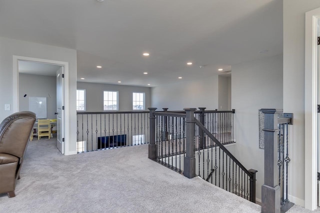 corridor featuring carpet flooring