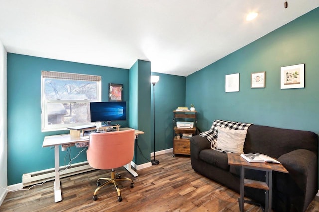 office with lofted ceiling, a baseboard heating unit, and dark hardwood / wood-style flooring