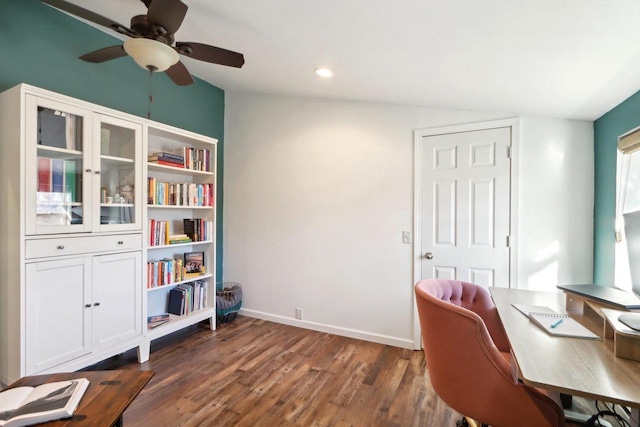 office space featuring vaulted ceiling, dark wood-type flooring, and ceiling fan