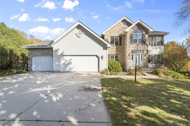 view of front property featuring a garage and a front lawn