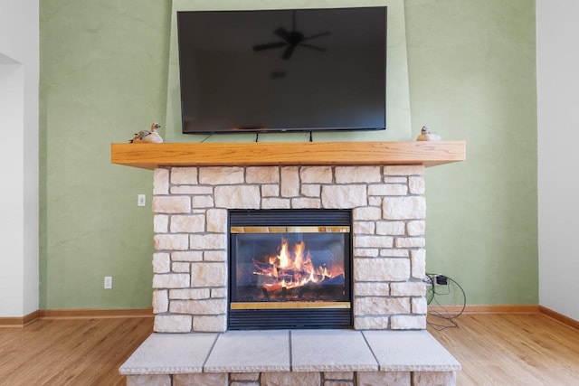 room details featuring hardwood / wood-style floors and a fireplace