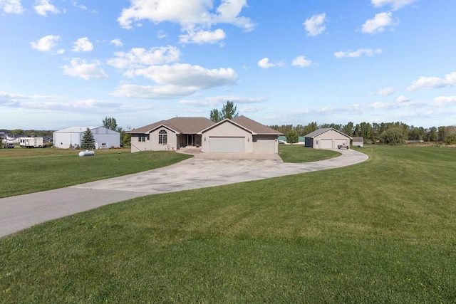 single story home featuring a garage and a front yard