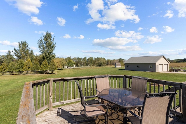 wooden deck featuring a yard