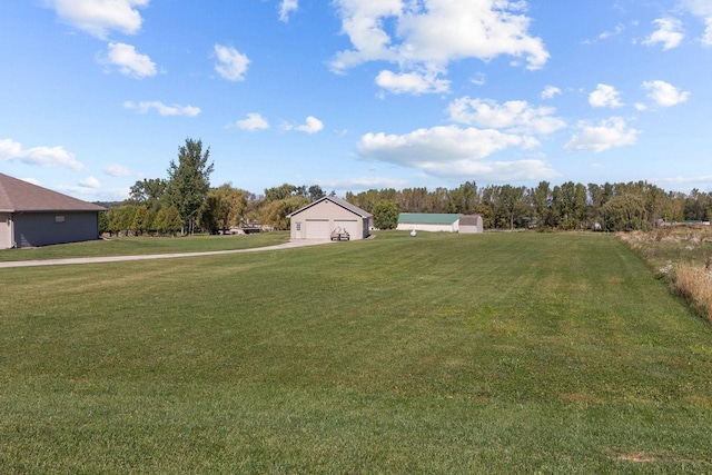 view of yard with a garage