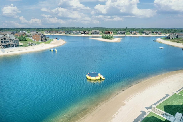 property view of water featuring a beach view