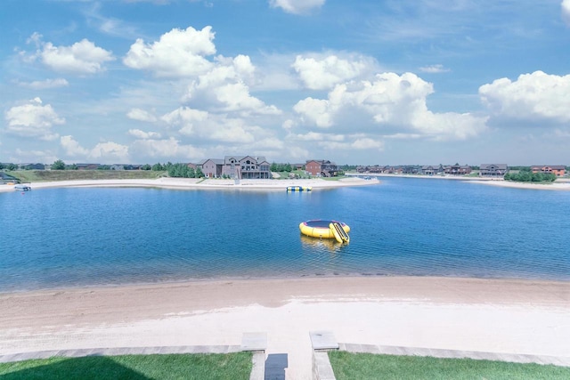 view of water feature with a beach view