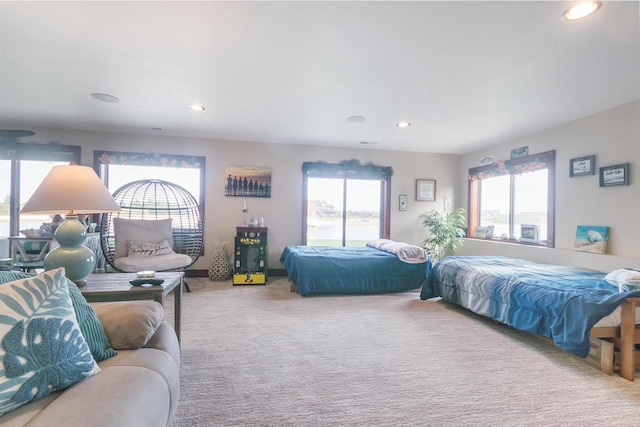 bedroom with light carpet