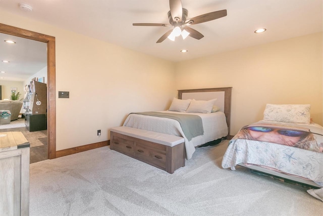 carpeted bedroom with ceiling fan