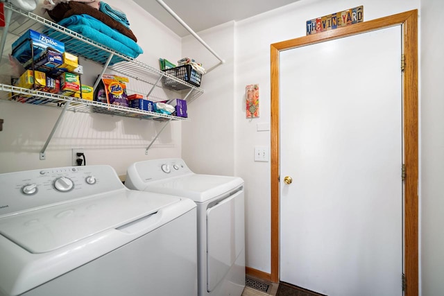 clothes washing area featuring washing machine and dryer