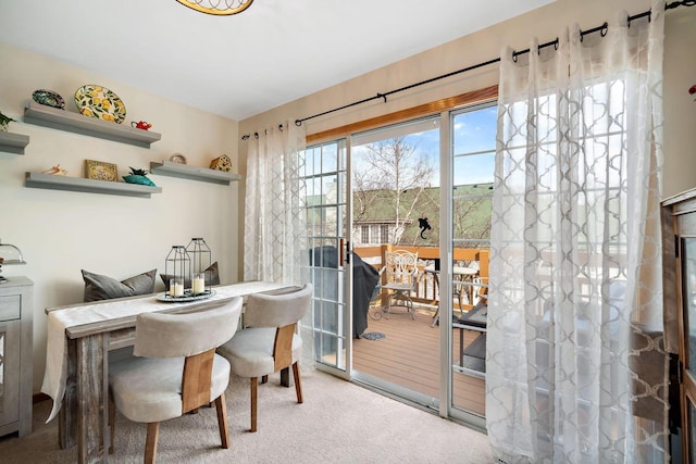 dining room with carpet flooring