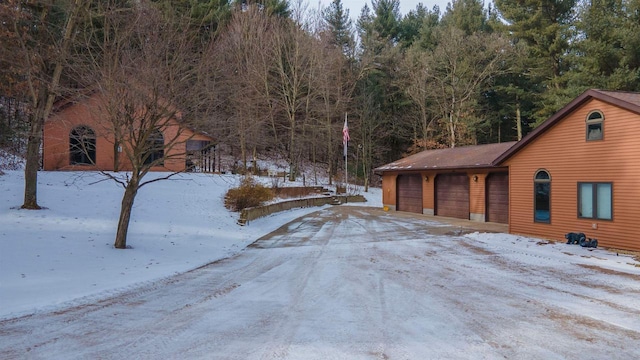 exterior space with a garage