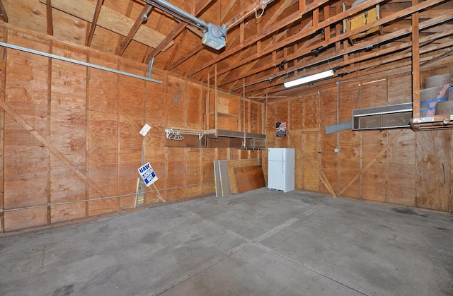 garage featuring white refrigerator