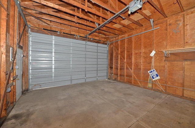 garage featuring a garage door opener