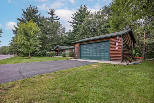 garage with a yard