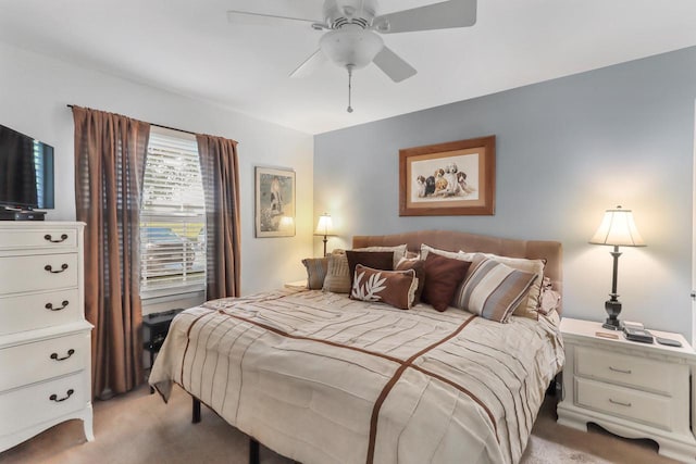 bedroom with light colored carpet and ceiling fan