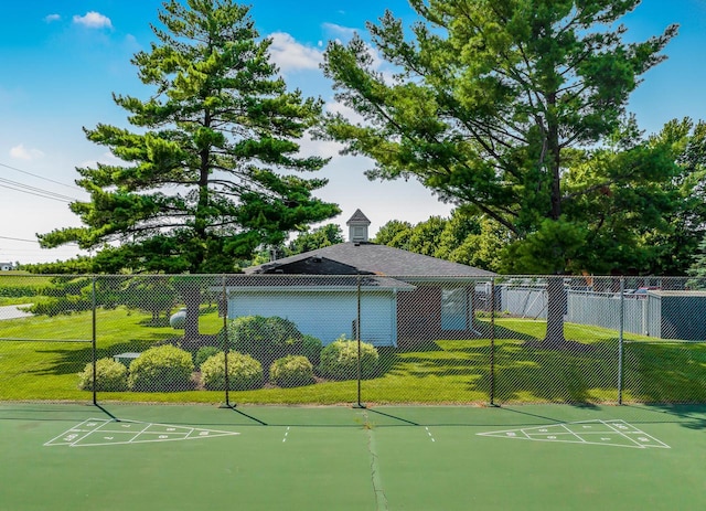 view of community featuring a yard