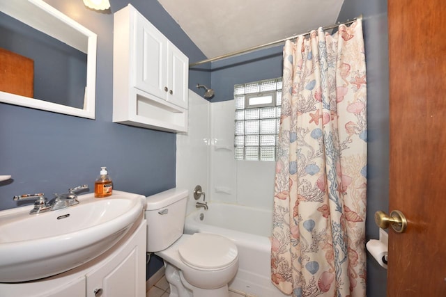 full bathroom featuring vanity, shower / bath combo, and toilet