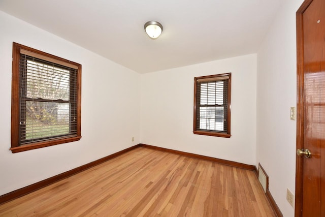 empty room featuring light hardwood / wood-style flooring