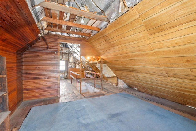 attic featuring an upstairs landing