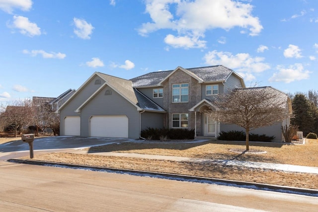 view of front of home with a garage