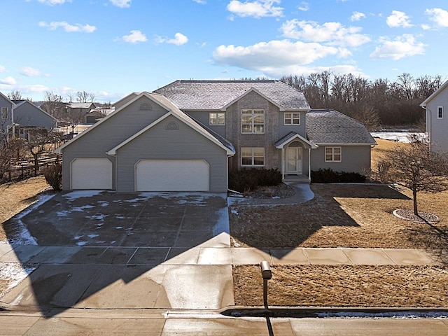 front facade with a garage