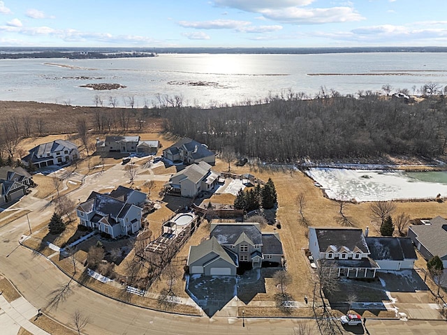 drone / aerial view with a water view