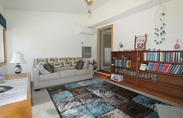 W5698 Losinski Rd, Princeton, WI 54968 - carpeted living area with a wall mounted air conditioner