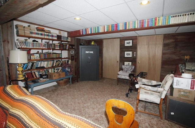 W5698 Losinski Rd, Princeton, WI 54968 - sitting room with wooden walls, a paneled ceiling, carpet floors, and recessed lighting