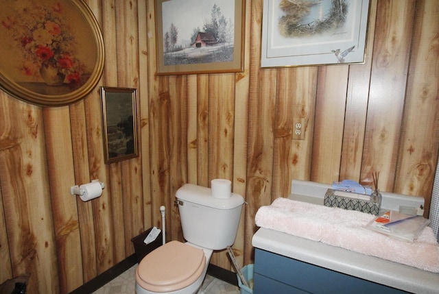 W5698 Losinski Rd, Princeton, WI 54968 - bathroom featuring wooden walls and toilet