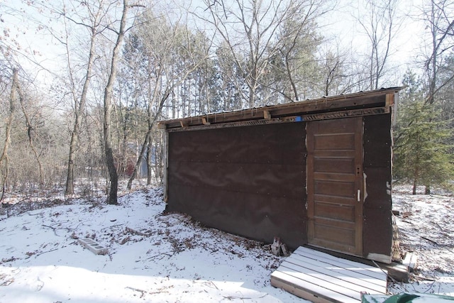 W5698 Losinski Rd, Princeton, WI 54968 - snow covered structure featuring an outdoor structure and a shed