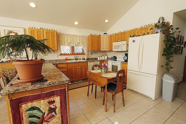 W5698 Losinski Rd, Princeton, WI 54968 - kitchen with white appliances, a sink, recessed lighting, light tile patterned floors, and brown cabinets