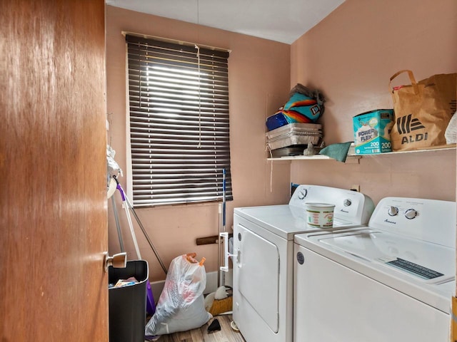 laundry room featuring washing machine and clothes dryer