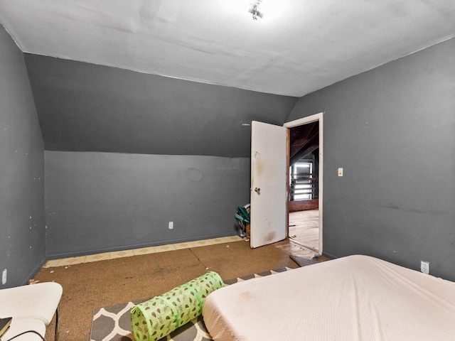 bedroom with vaulted ceiling