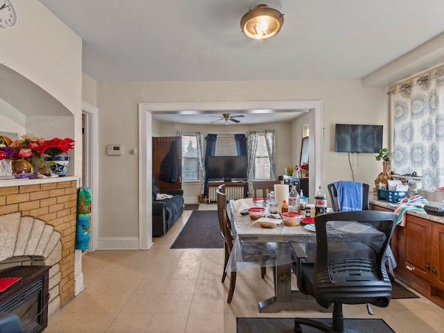 dining space featuring ceiling fan