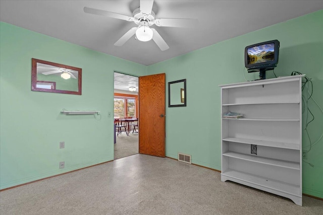 unfurnished room featuring ceiling fan