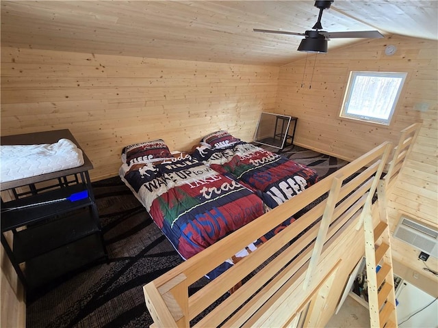 2756 7 5/8 Ave Unit 1, Chetek, WI 54728 - bedroom featuring wood walls, lofted ceiling, and ceiling fan