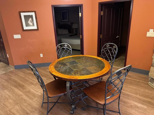 dining room with light hardwood / wood-style floors