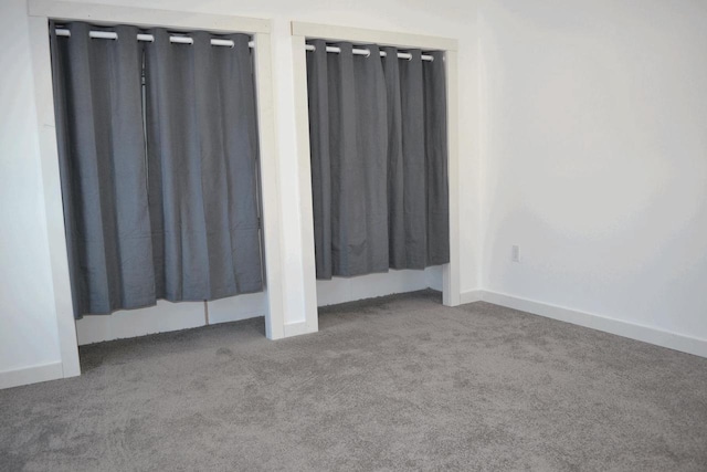 unfurnished room featuring carpet floors