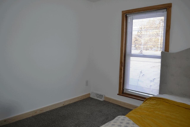 unfurnished bedroom featuring carpet flooring