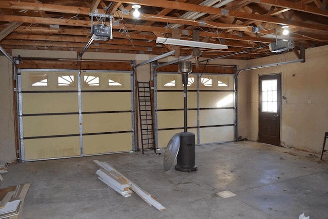 garage featuring a garage door opener