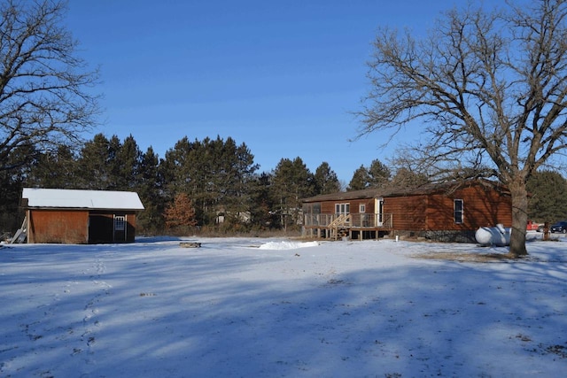 view of yard covered in snow