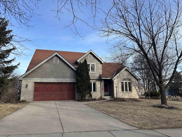 view of front of home with a garage