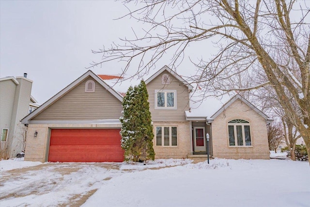 view of front of property with a garage