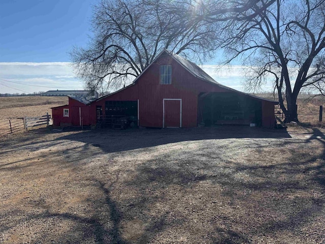 view of outbuilding featuring a rural view