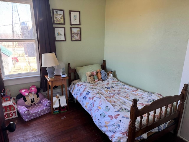 bedroom featuring dark wood-type flooring